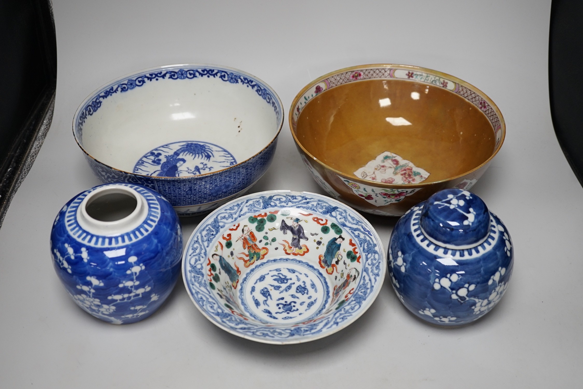 A group of Japanese and Chinese ceramics to include two blue and white jars, a wucai bowl etc.